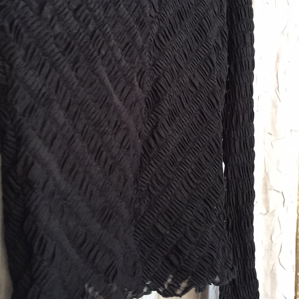 Sheer, stretchy long sleeve top